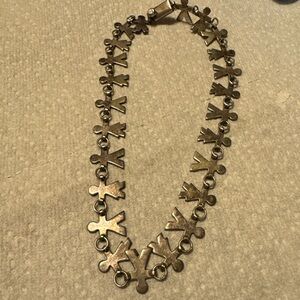 Silver interlocking children necklace